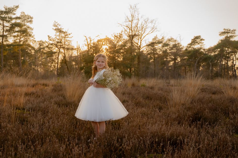 Fotograaf met warme stijl voor dromerige foto's van je communicant